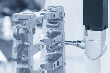 Closeup the Coordinate Measuring Machine (CMM) while measure the sample