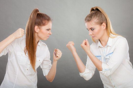 Angry fury girls punching and fighting