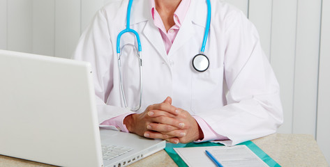 Doctor woman working in clinic.