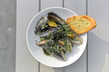 Close up of mussels baked with white wine. Selective focus.
