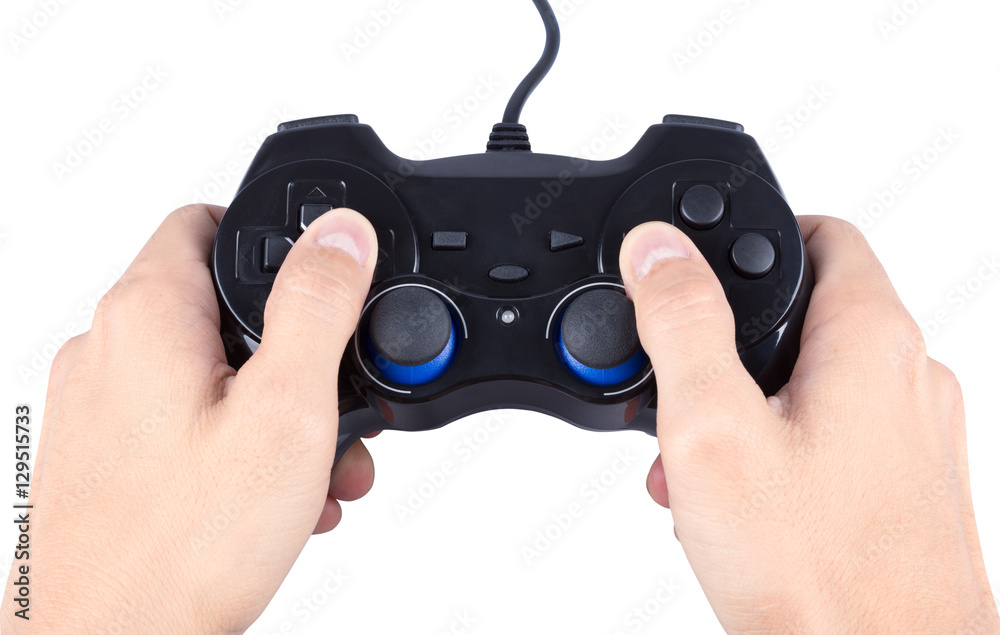 Wall mural hand playing joystick isolated on white (with clipping path)