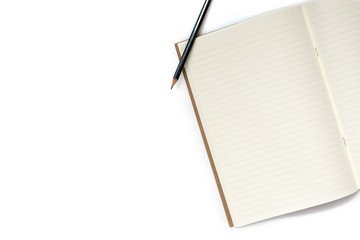 Top view of open notebook and pencil with copy space background
