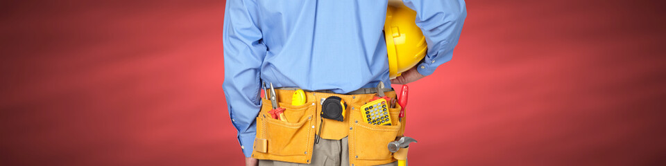 Fototapeta na wymiar Construction worker with a tool belt.