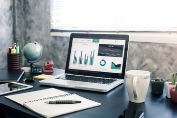 Office workplace with laptop on the desk