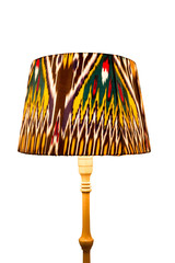 Classic floor lamp with soft light and oriental ornaments on a white background