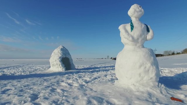 Ob Sea in winter with snow women. Novosibirsk, Siberia, Russia