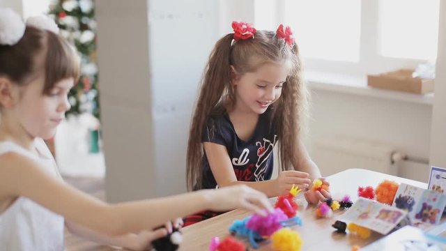 two pretty girls play indoor