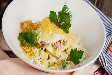 Salad with ham, cheese, egg and apple