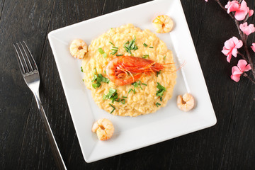 Risotto with scampi sauce - 129526176