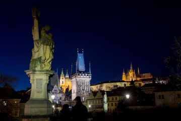 Obraz premium Night photo of Prague Charles Bridge and powder tower