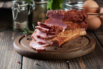 Smoked bacon with chopped slices, ready to prepare a traditional breakfast with eggs