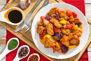 Sweet and Sour crispy fried pork pieces, close-up