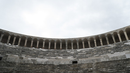 Obraz premium Detail view of historical old ancient city of Aspendos amphitheater in Antalya.- TURKEY