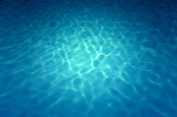 Fototapeta na wymiar Swimming pool blue water