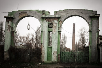 Ukraine, Odessa area destroyed factory. Ruined stone, brick arch and the ruins of the destroyed building or premises.