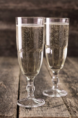 celebration with champagne,Two Champagne Glasses on wooden table, Mother's ,father's , Valentine's day concept
