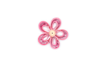 flower made by quilling on a light background