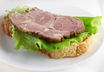 sandwich with greens and meat