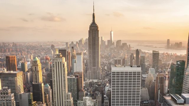 Aerial view of Manhattan skyline. Zoom out. Sunset. Vintage. Time lapse.
