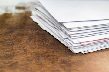 Documents and envelopes on office table