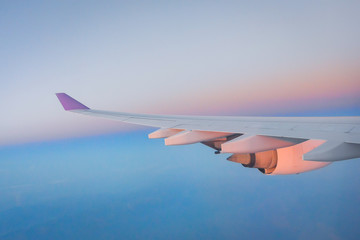 Adventure, travel, transport concept. View from plane window at