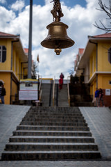 Large beautiful bell hanging on entrance of a temple gate in Shimla, India
