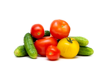 tomatoes and cucumbers isolated on white background
