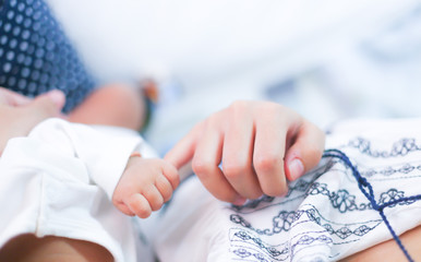 Soft focus and blurry of Baby Hands , selective focus , vintage