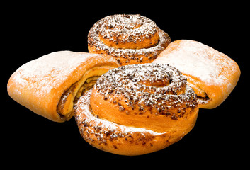 Isolated image of buns on a black background.