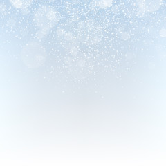 Winter abstract background with falling snowflakes and sparkles.