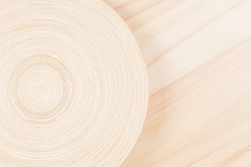Soft beige white wooden background with abstract circles. Wood texture. Top view.