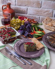 eggplant with garlic, walnuts and greens