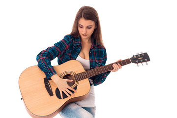 young pretty brunette woman with guitar