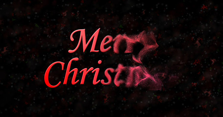 Merry Christmas text turns to dust from right on black background