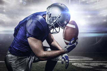 Fotobehang Voetbal Composite image of upset american football player with ball  © vectorfusionart