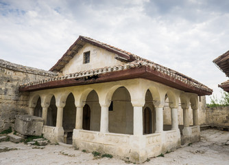 Fototapeta na wymiar Reconstructed Karaim kenasa in medieval cave town Chufut-Kale.