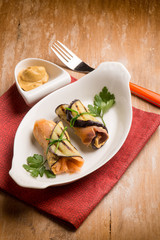 salmon rolled up with eggplant and mustard
