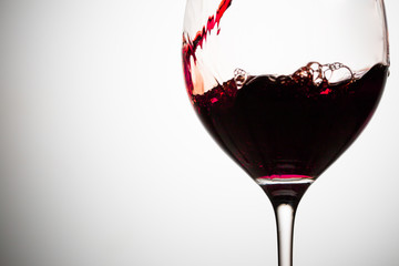 Half filled red wine glass