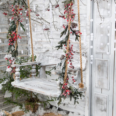 Christmas decorations in the Rustic style. Snow-covered wooden s