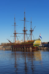 Fototapeta na wymiar The ship replica in front of the National Maritime Museum in Amsterdam, The Netherlands