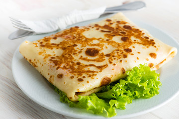 delicious pancakes on a white plate