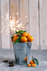 orange mandarins with a Sparkler