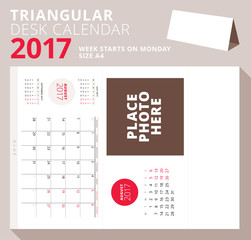 Triangular desk calendar for 2017 year. August 2017. Week starts on Monday. Printable stationery template with place for photo. Vector illustration