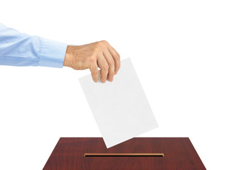 Hand with paper ballot