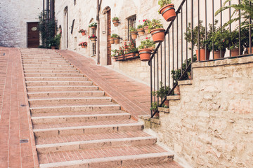 Obraz premium Staircase street of the old town of Assisi with ancient stone h