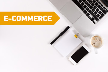 E-Commerce text on the desk with copy space