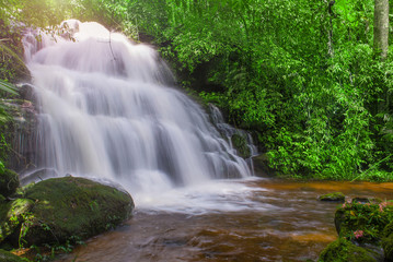 beautiful waterfall in rainforest at phu tub berk mountain  phet