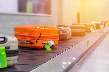 Suitcase or luggage with conveyor belt in the airport - 129553738