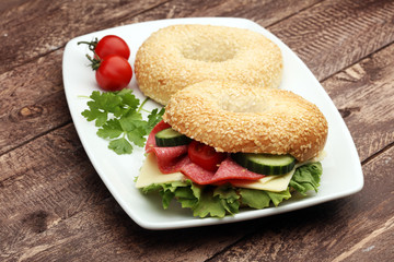 Delicious bagel sandwich on the table