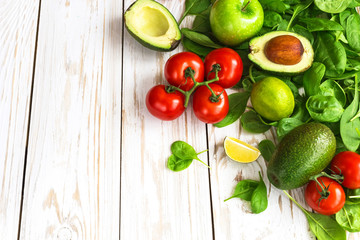 Spinach, lime, avocado, cherry tomatoes,  and apple